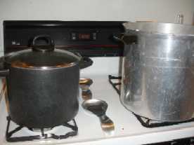 pot on stove and water bath canner heating up