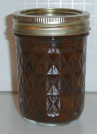 Single jar of finished peach chutney