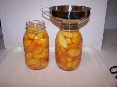 filling the canning jars